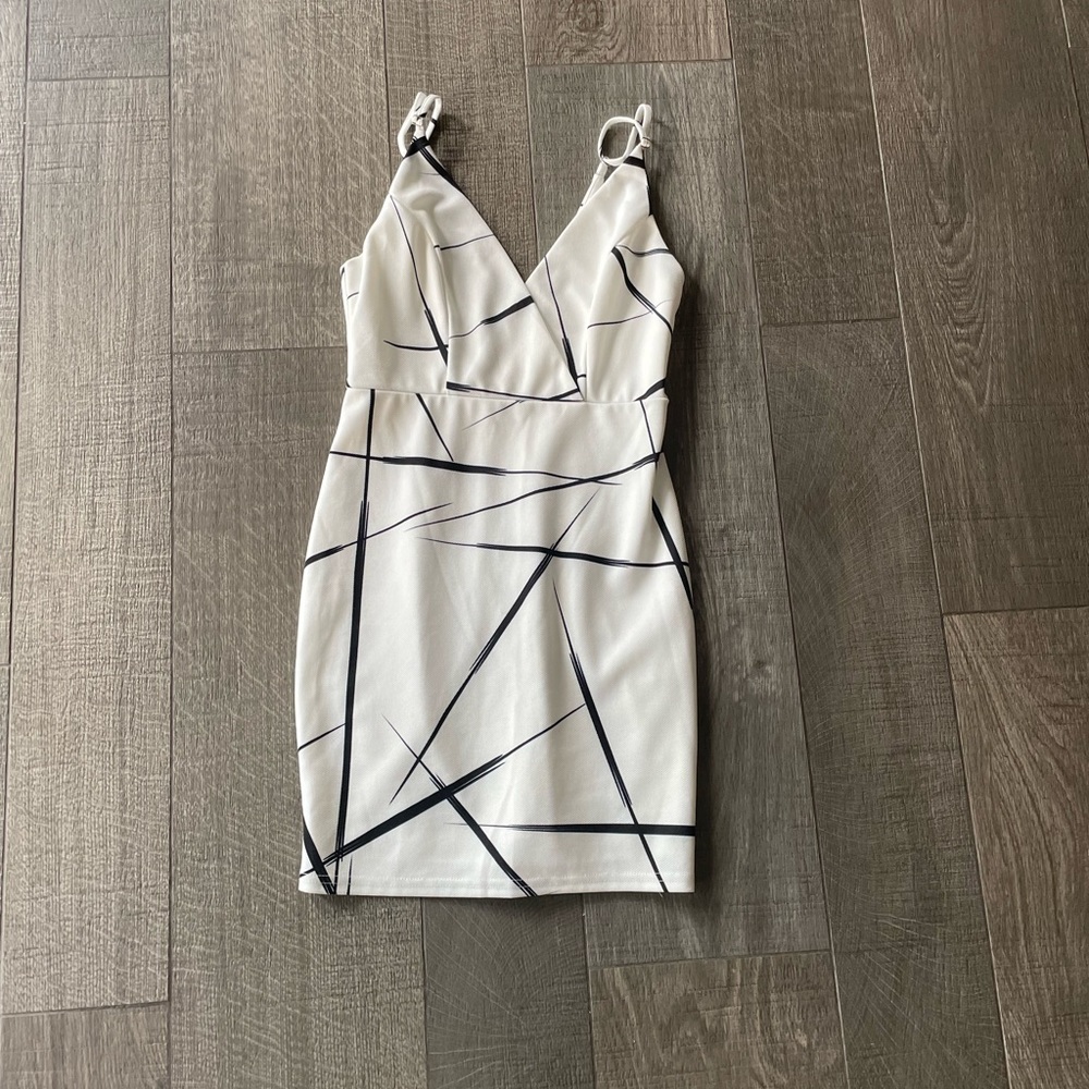 L’ATISTE mini asymmetrical dress